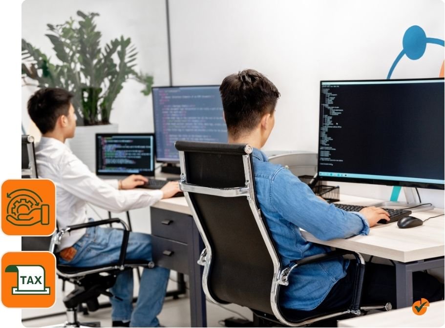 Two programmers working at computers